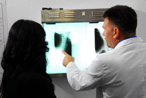 Dr. Michael shows patient x-rays